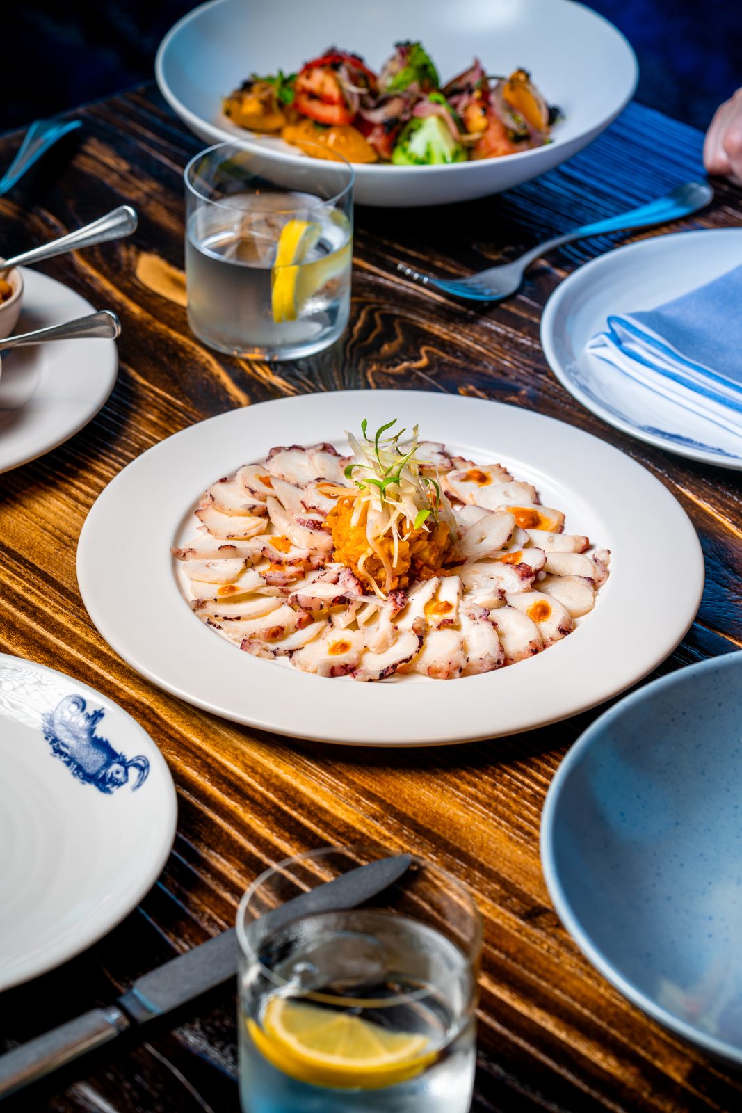 Brasero Atlántico Bahrain: Crudo and small plates on the table