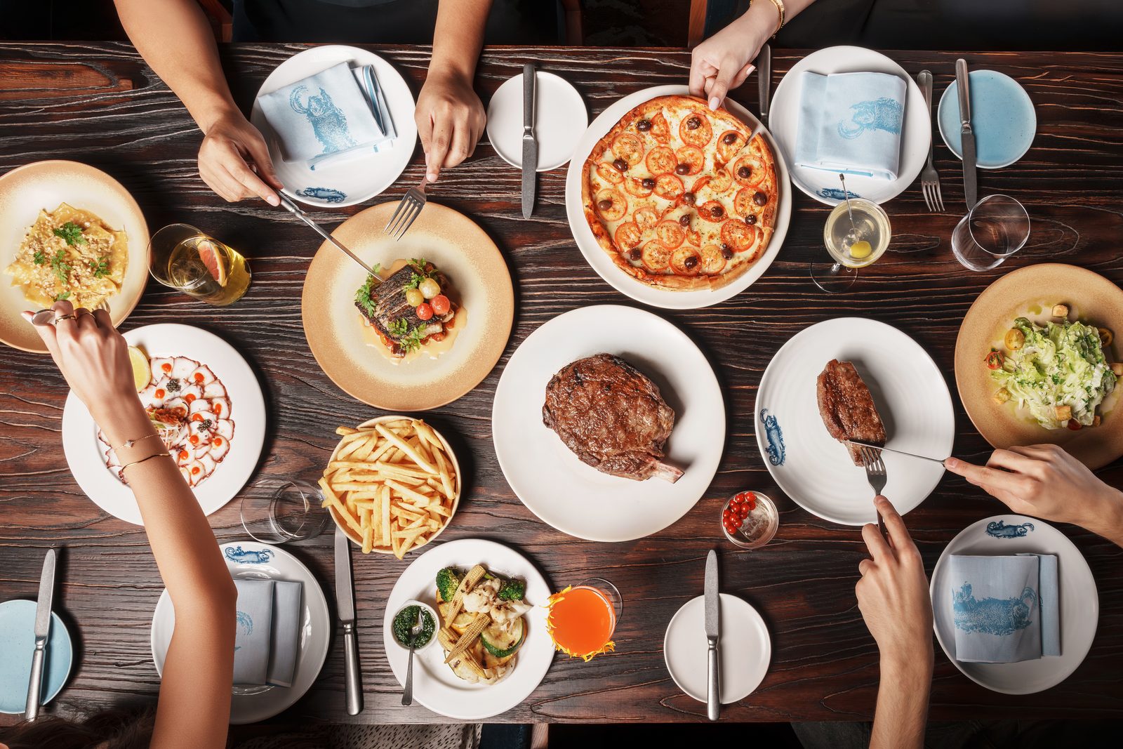 Brasero Atlántico Bahrain: A shared table at Brasero Atlántico, seen from above